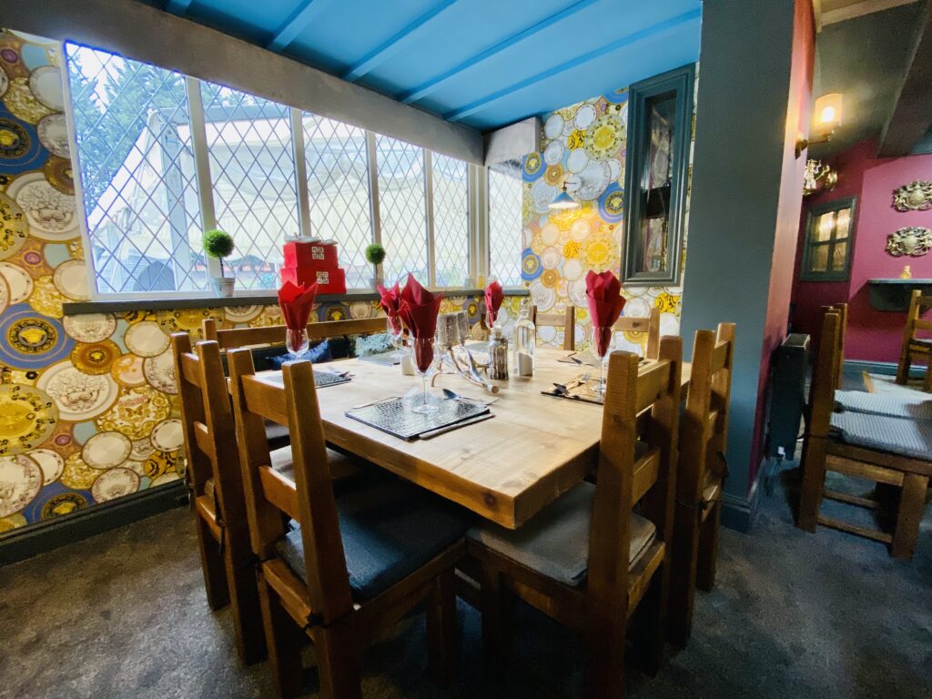 The Mayflower at Austerfield, refurbished pub interior with dining tables ready for service